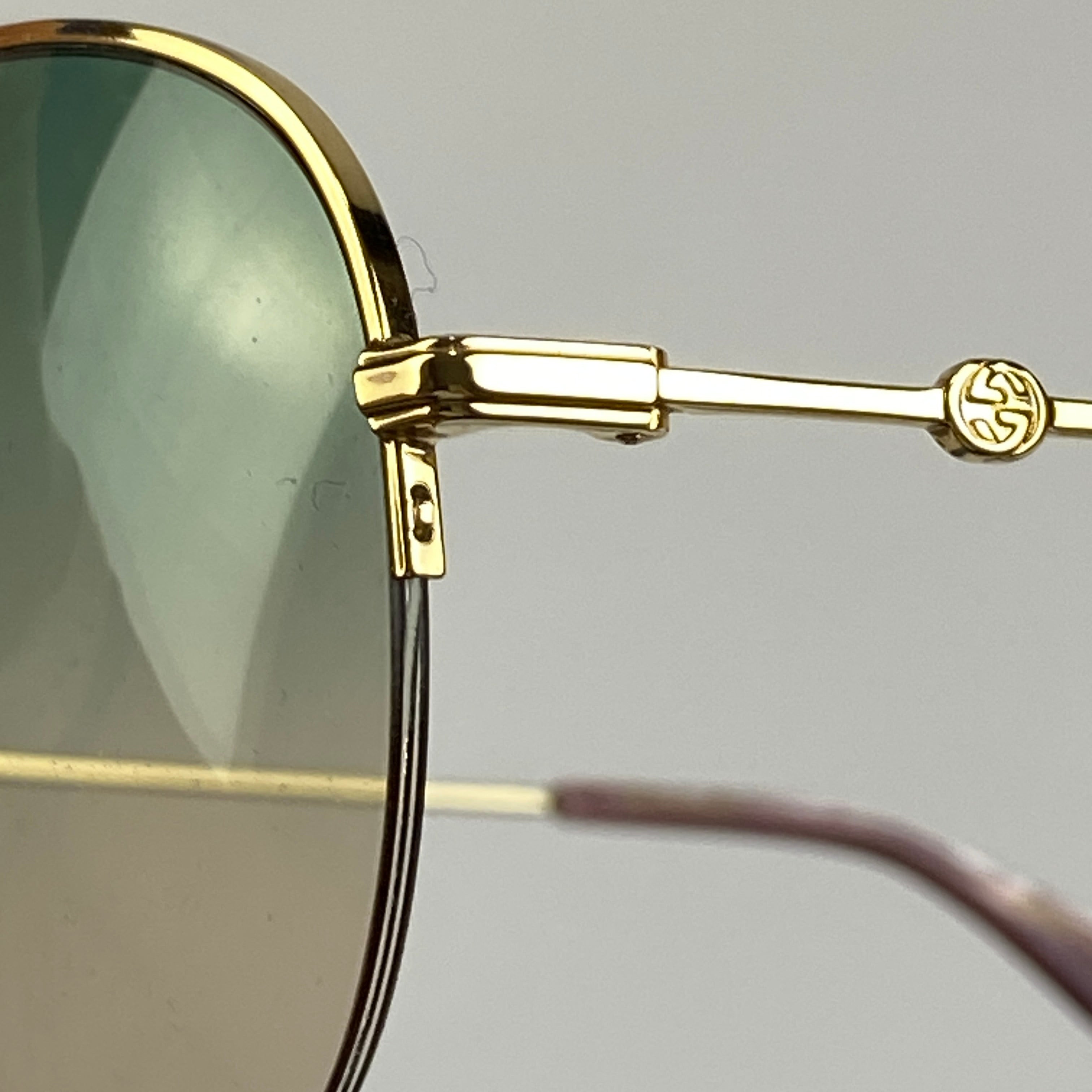 Gucci Gold Aviator GG0107S Sunglasses