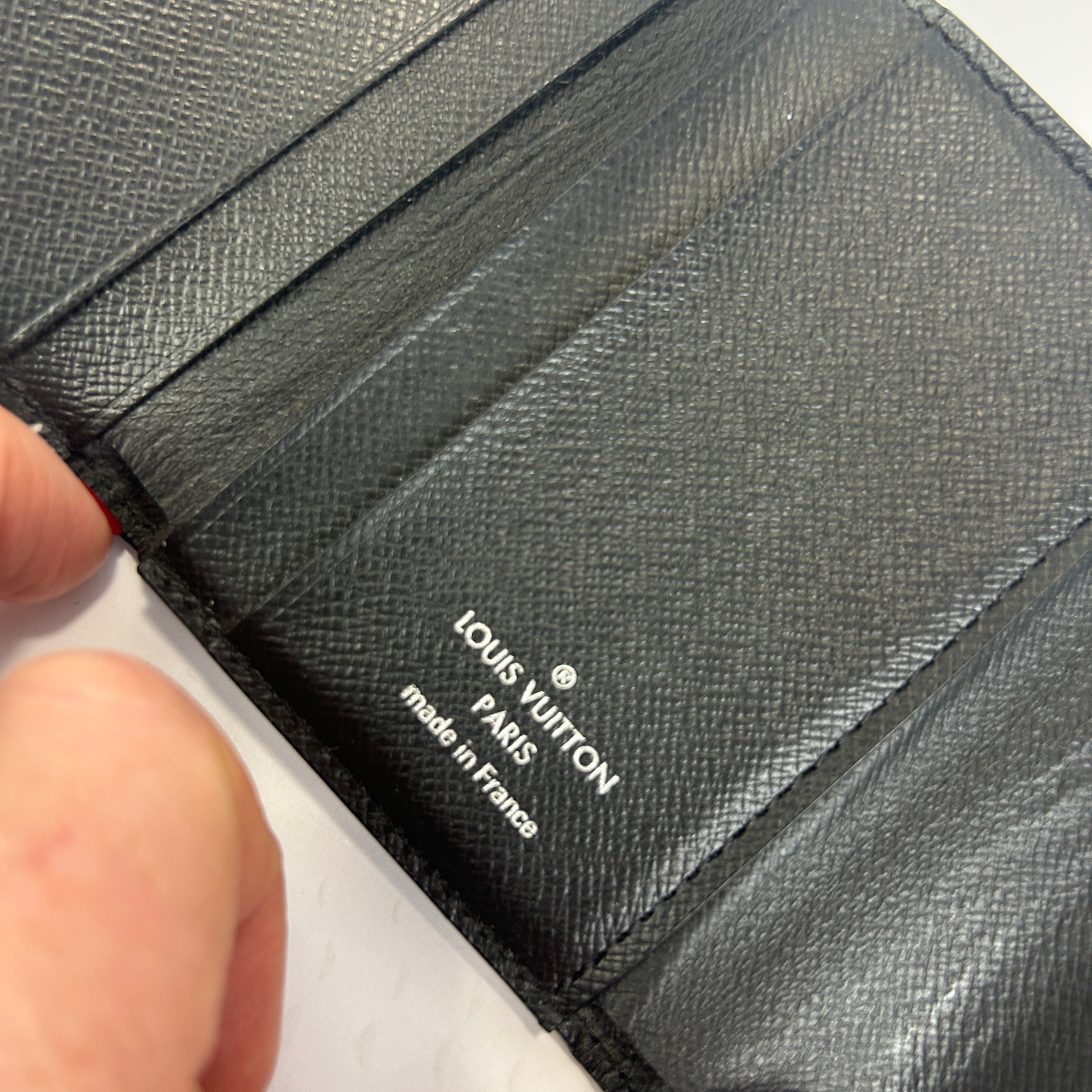 Louis Vuitton £650 Black Epi Leather Twist Compact Wallet